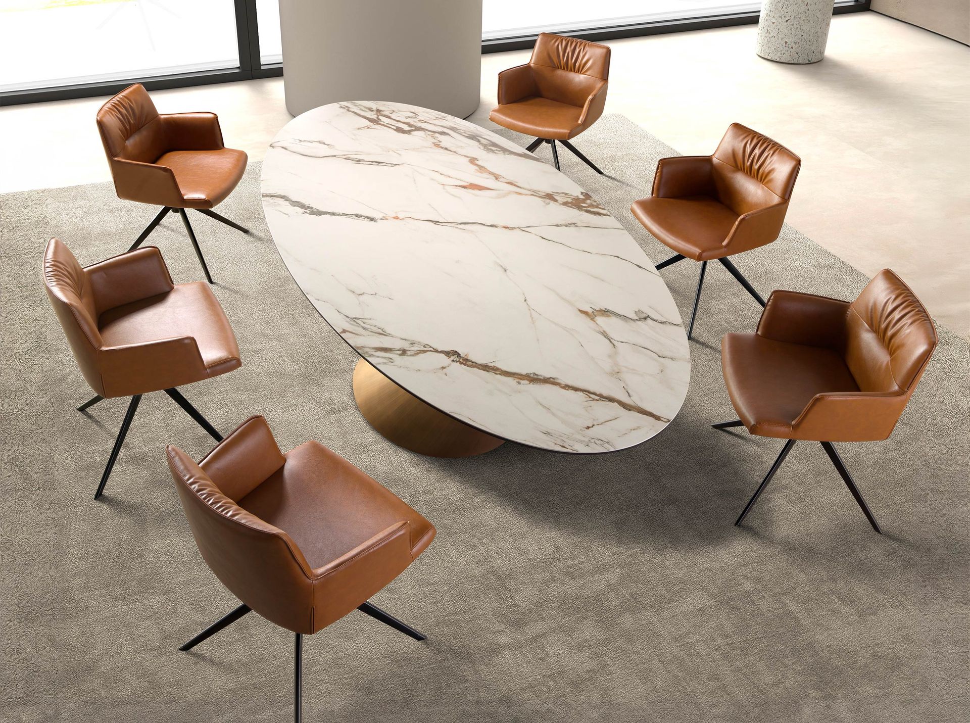 Cam laminasyonlu oval porselen masa tablasında ince kenar ve bütünleşik yüzey görünümü